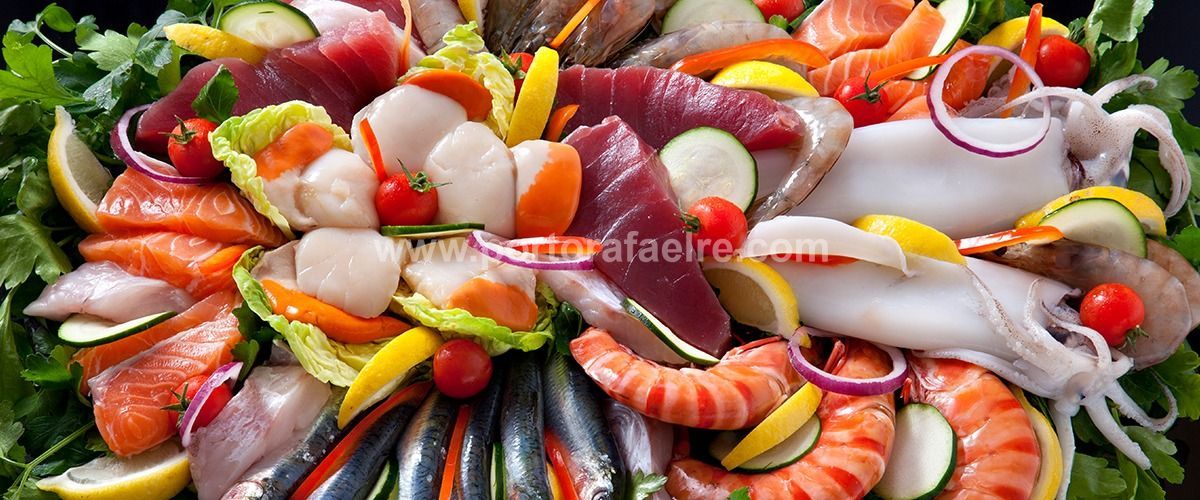 a variety of seafood and vegetables on a plate