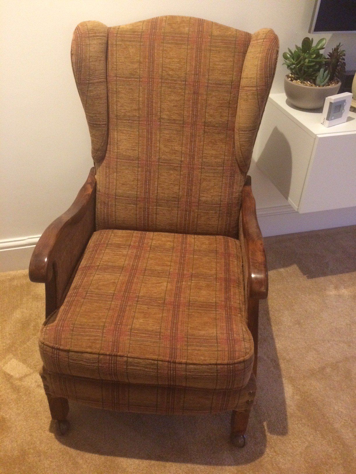 Front view of chair in brown checked pattern