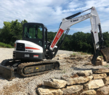 Backhoe — Foristell, MO — Wildschuetz Bros. Trucking Inc Backhoe — Foristell, MO — Wildschuetz Bros. Trucking Inc