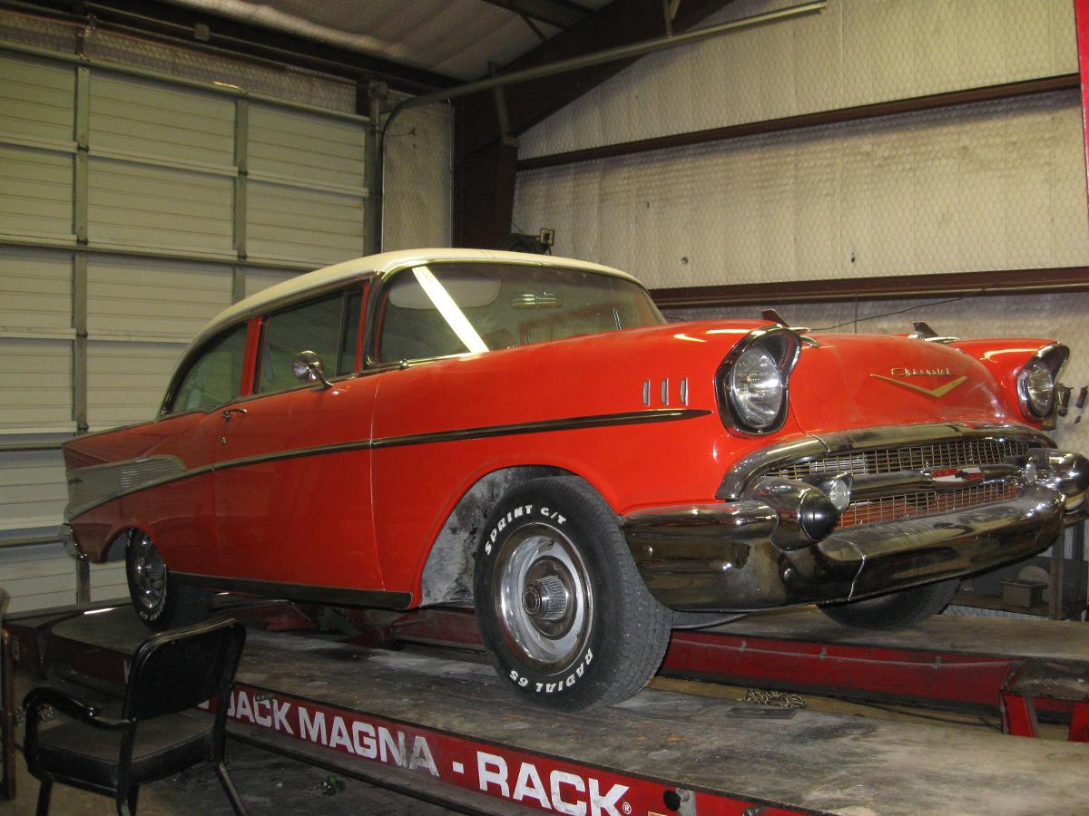 Mechanic Installing Car Tire — San Angelo, TX — Caddo Street Wheel Alignment & Brake Shop, Inc