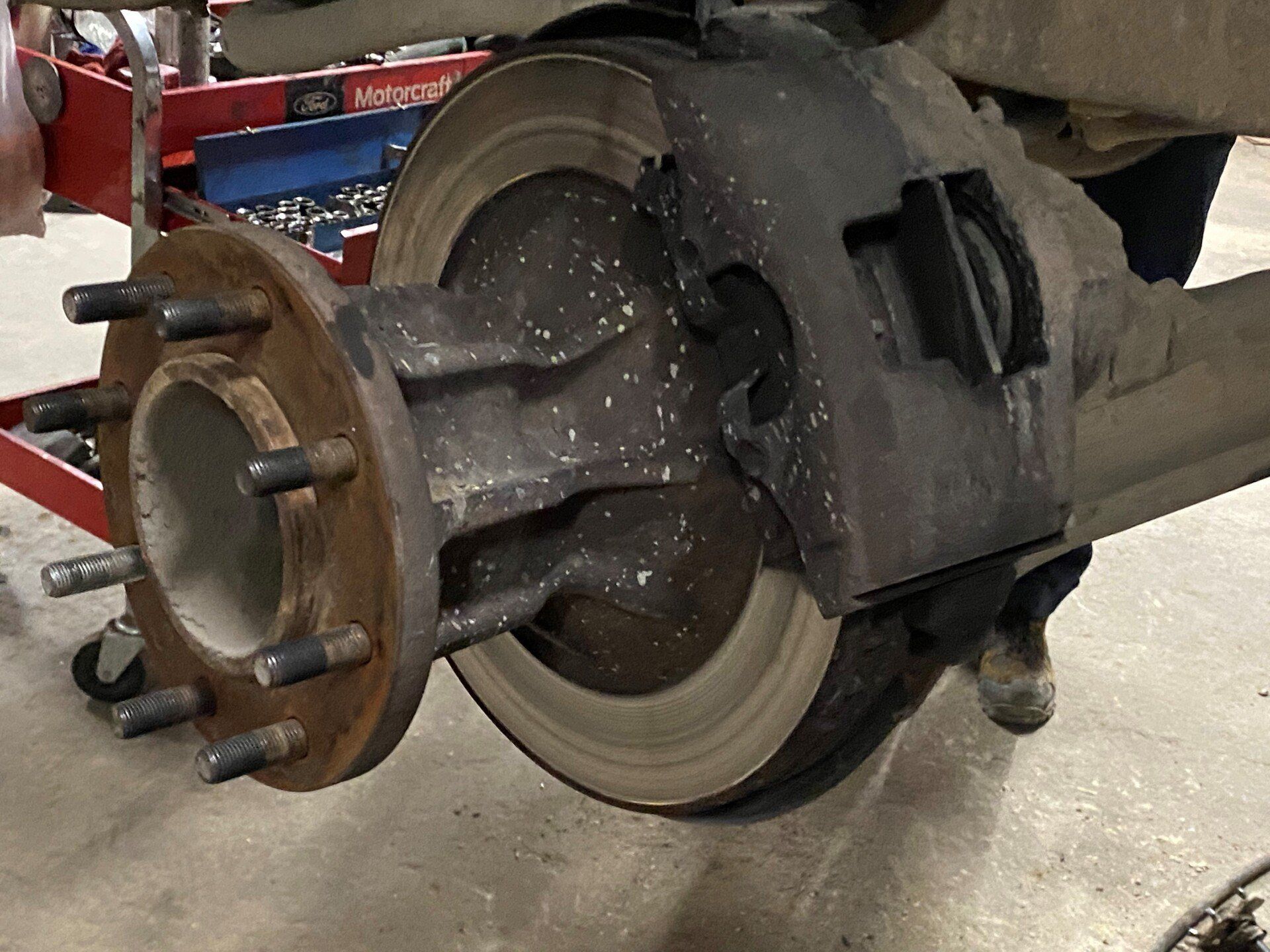 Man Checking Brake Fluid — San Angelo, TX — Caddo Street Wheel Alignment & Brake Shop, Inc