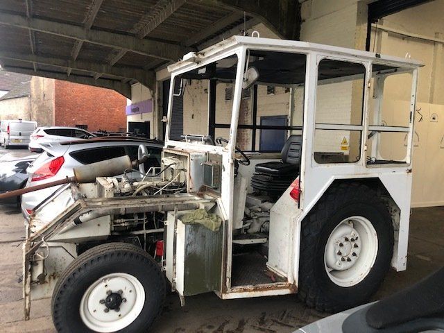 Old manual handling vehicle chassis in process of refurbishment - side image
