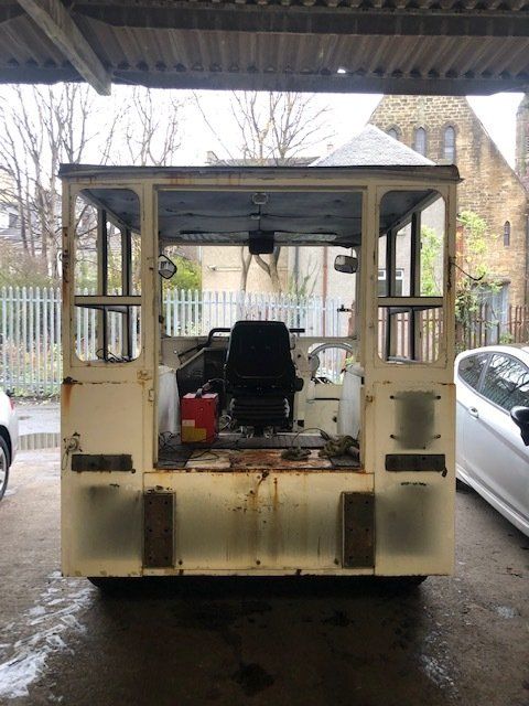 Old manual handling vehicle chassis in process of refurbishment - rear image