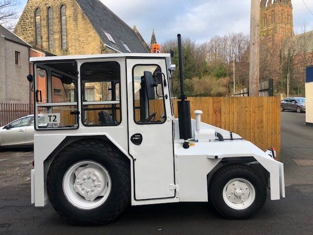 Refurbished white manual handling vehicle