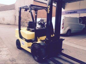 Yellow forklift truck