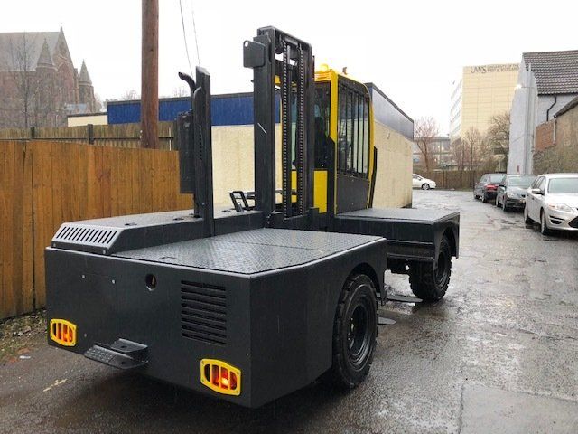 Yellow side loader