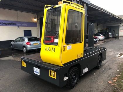 Modern forklift truck on gray background