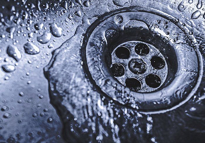 Water Drain In Stainless Sink — Spring Valley, CA — Infinity Plumbing & Construction Inc.