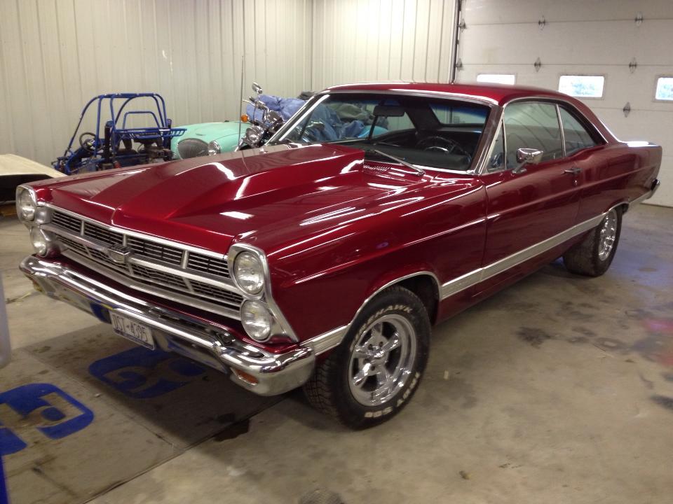 red car in garage