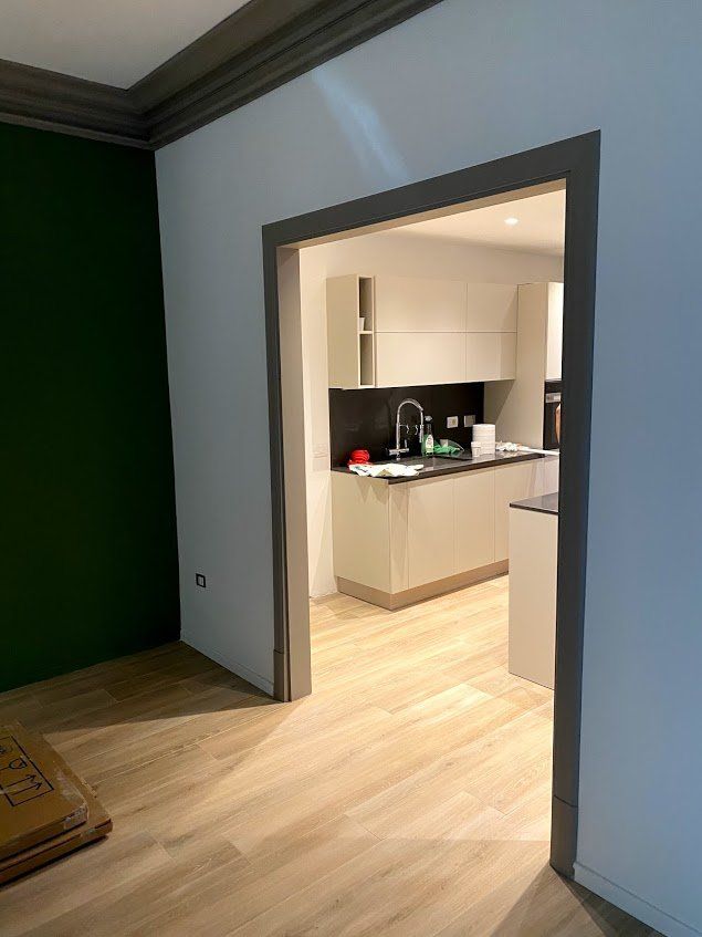 ristrutturazione appartamento moderno a Roma con cucina open space