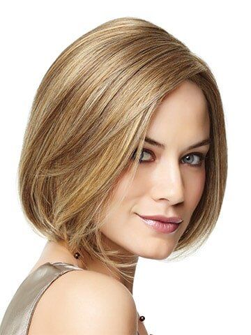 Smiling Woman with Medium Hair — Westbury, NY — Wig Wam Hair