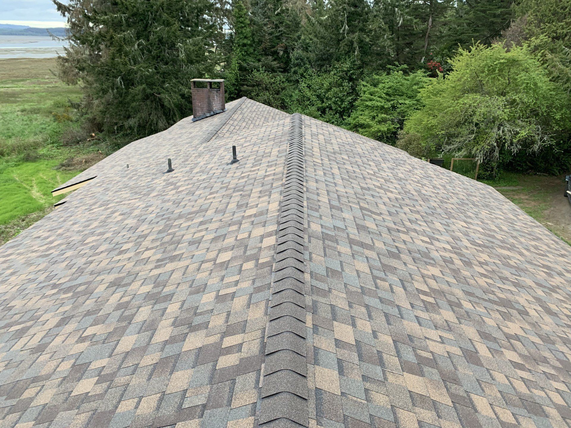 Shingle roofing installation in Ocean Park, WA by professional roofing company