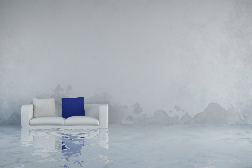Couch in the midst of major water damage. Restoration 1 of Morris County.