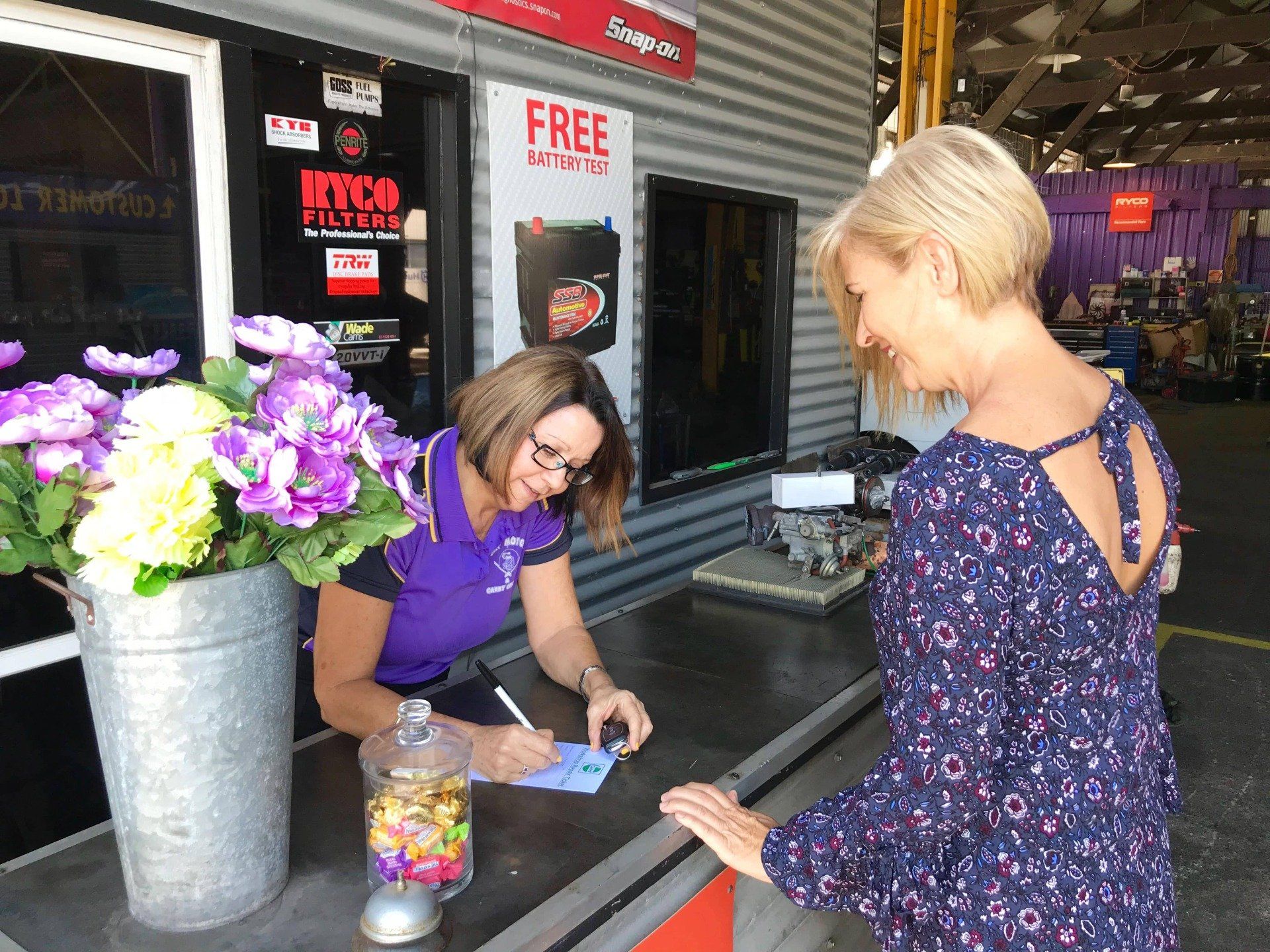 Customer Smiling with Owner Customer Smiling with Owner