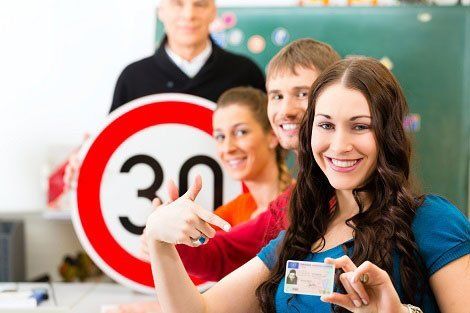 Woman Holding Card — Tucker, GA — Taggart's Driving School Woman Holding Card — Tucker, GA — Taggart's Driving School