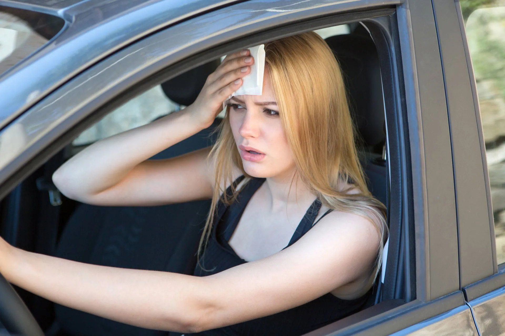 Woman Driving Under Hot Weather — Tucker, Ga — Taggart's Driving School