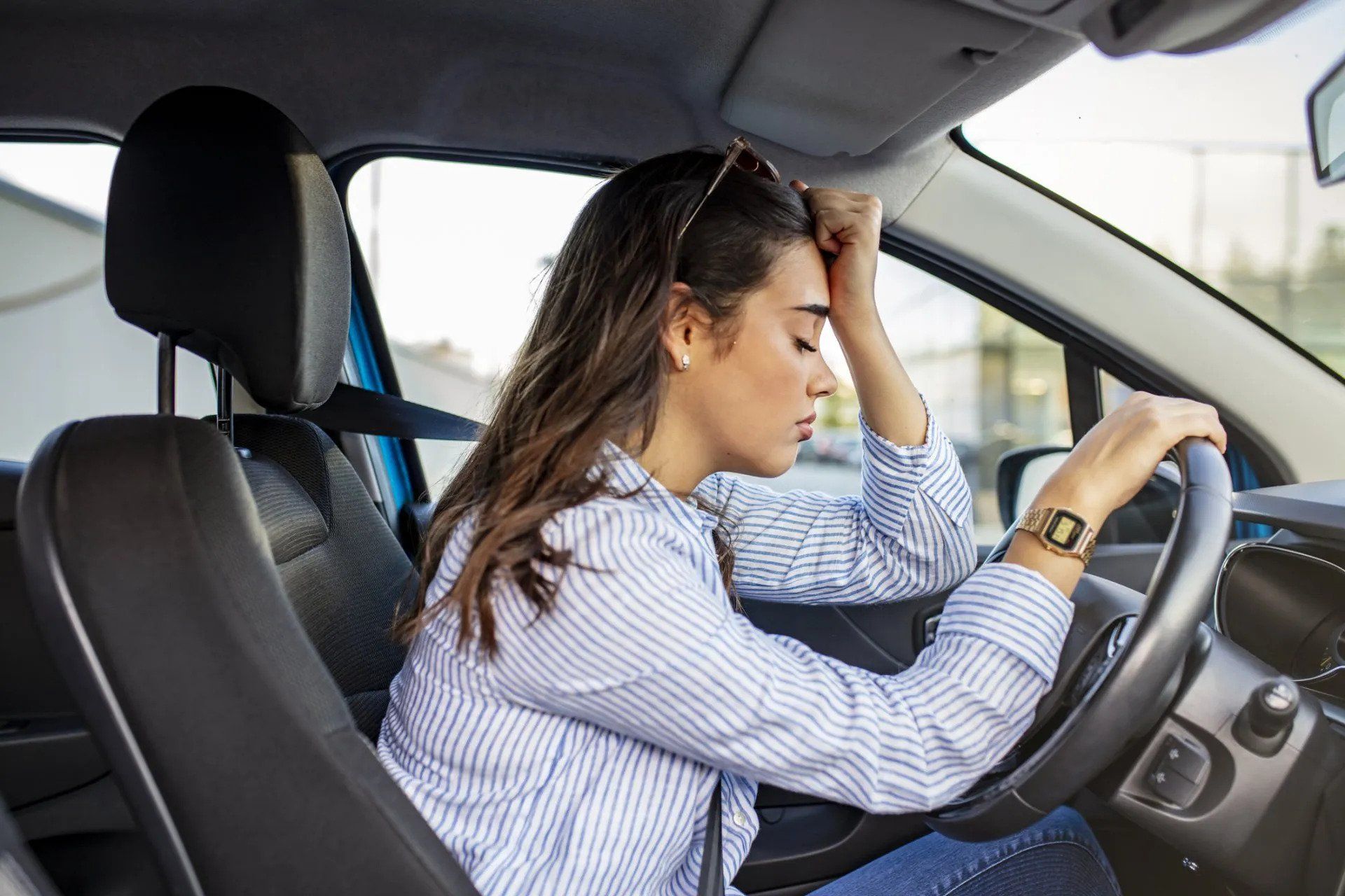 Young Woman Waiting To Traffic Go Signal — Tucker, Ga — Taggart's Driving School Young Woman Waiting To Traffic Go Signal — Tucker, Ga — Taggart's Driving School
