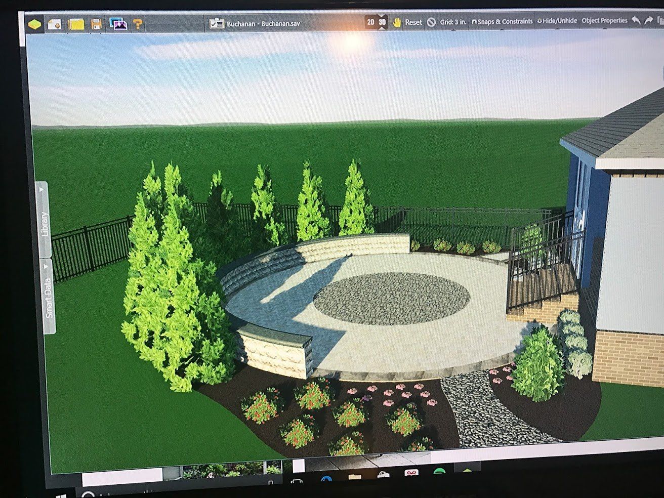 3D rendering of circle patio hardscape with landscaping surrounding