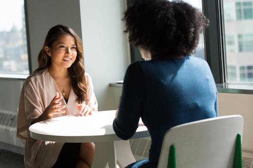 woman-talking-round-table
