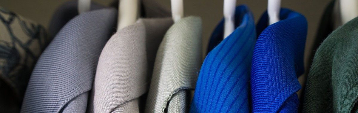 Clothes Hanging in a Closet