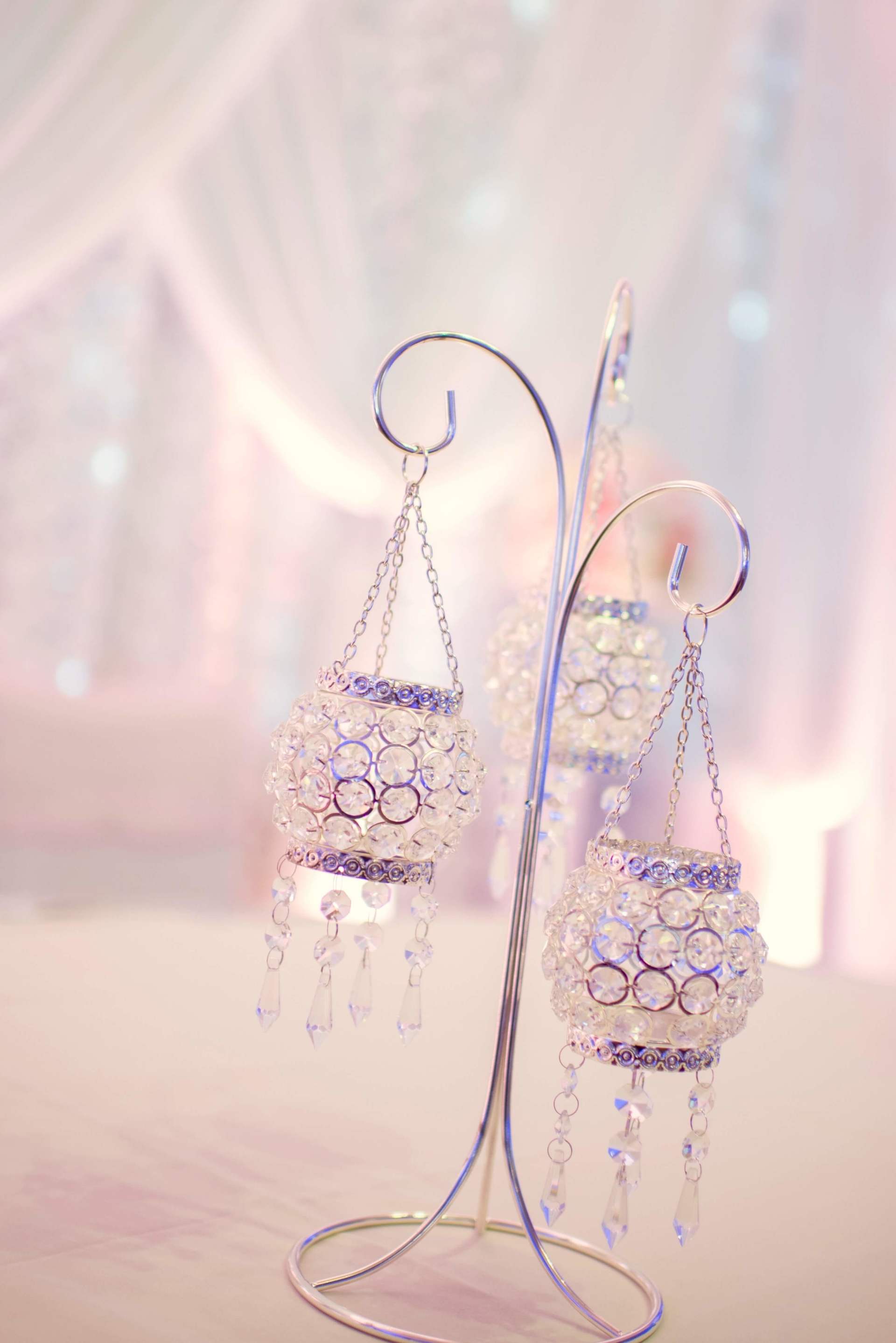 A couple of candle holders sitting on top of a table.