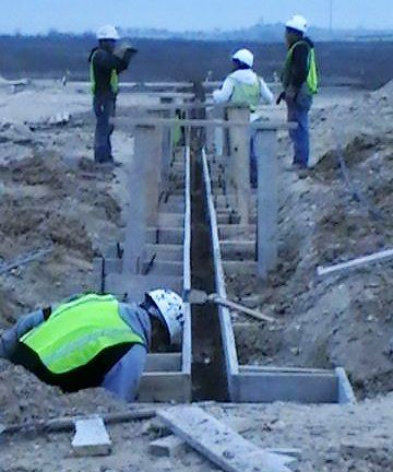 Commercial concrete contractors at work in College Station, TX