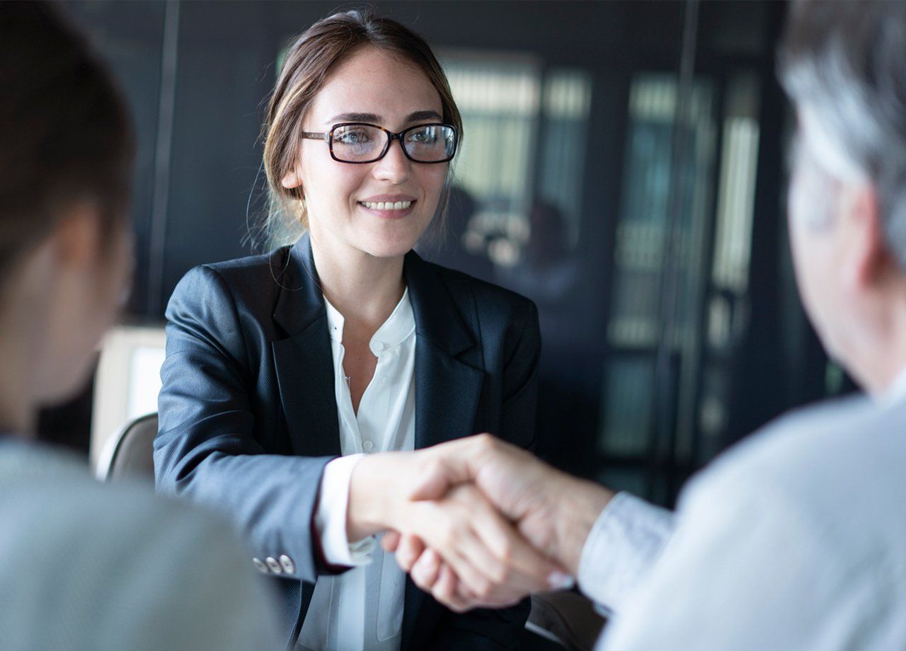 Insurance Agent Shaking Hands With Client — Huntersville, NC — Affordable HealthCare Solutions INC Insurance Agent Shaking Hands With Client — Huntersville, NC — Affordable HealthCare Solutions INC
