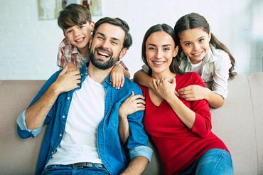 Young Happy Family — Huntersville, NC — Affordable HealthCare Solutions INC
