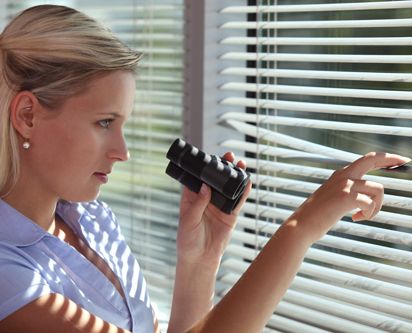 Private investigator through blind