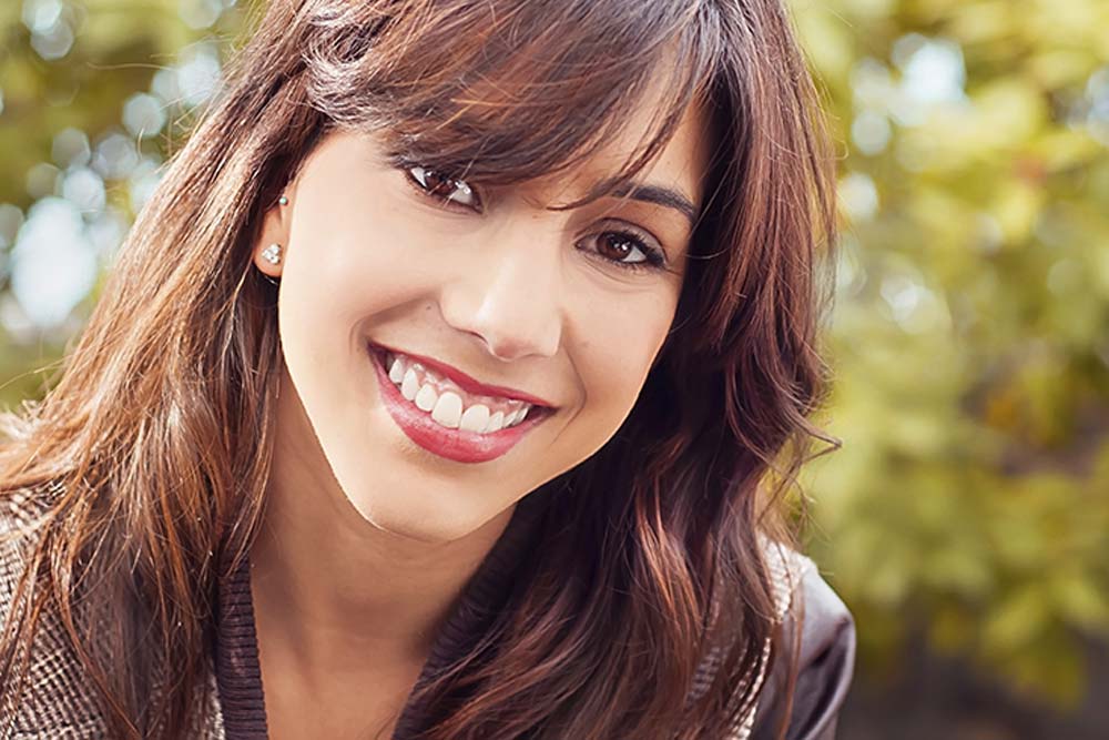 Anxiety Management smiling woman with perfect white teeth