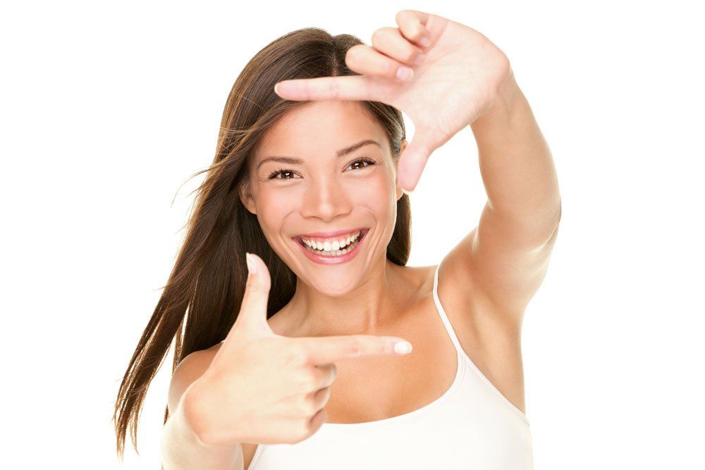 smiling girl who has had tooth whitening