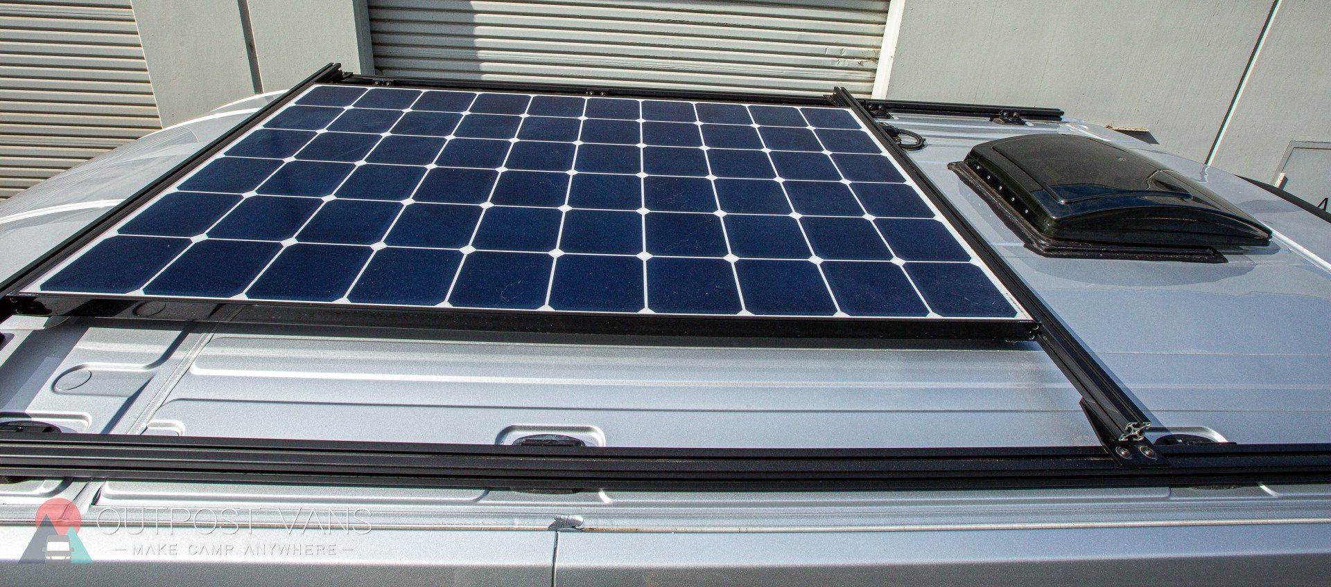 a solar panel is mounted to the roof of a van