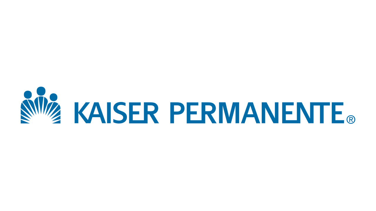 Kaiser Permanente logo: Blue emblem of people and sun rays next to 