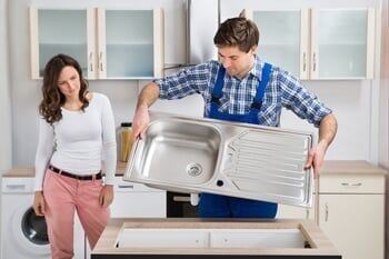 Worker with sink Worker with sink