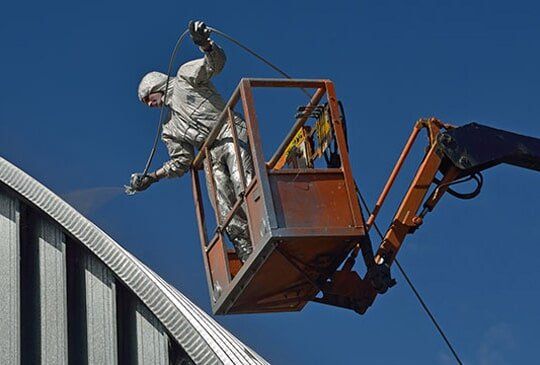 Mackay Painter doing Commercial Painting Mackay Painter doing Commercial Painting Using Spray Gun - Mackay, QLD