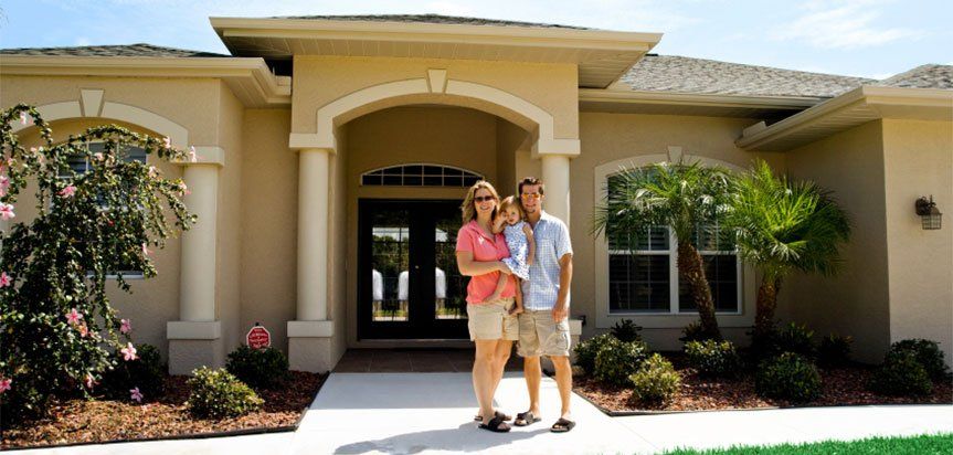 people in front of house