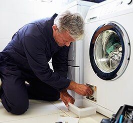 Fixing Washing Machine — Appliance Repair in Wauwatosa, WI Fixing Washing Machine — Appliance Repair in Wauwatosa, WI