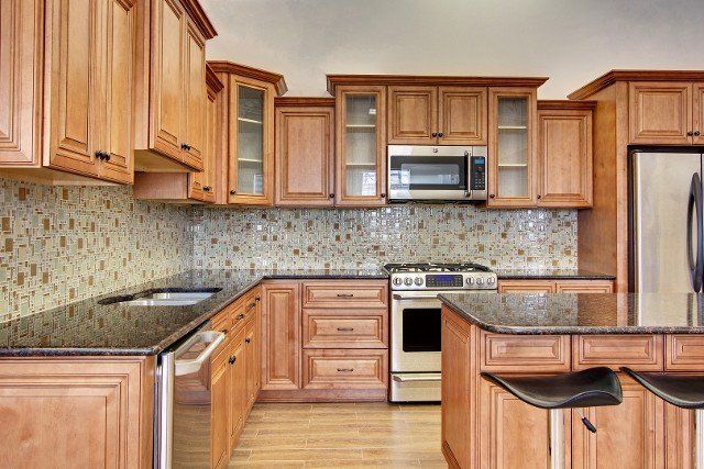 Medium Wood stain cabinets