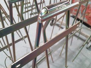 professional spraying chemical on metal