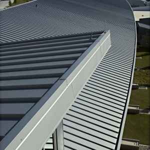 View of a corrugated metal roof on a modern building.