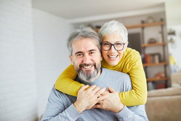 Senior Couple Smiling — Metairie, LA — Jeffry Leeson, DDS