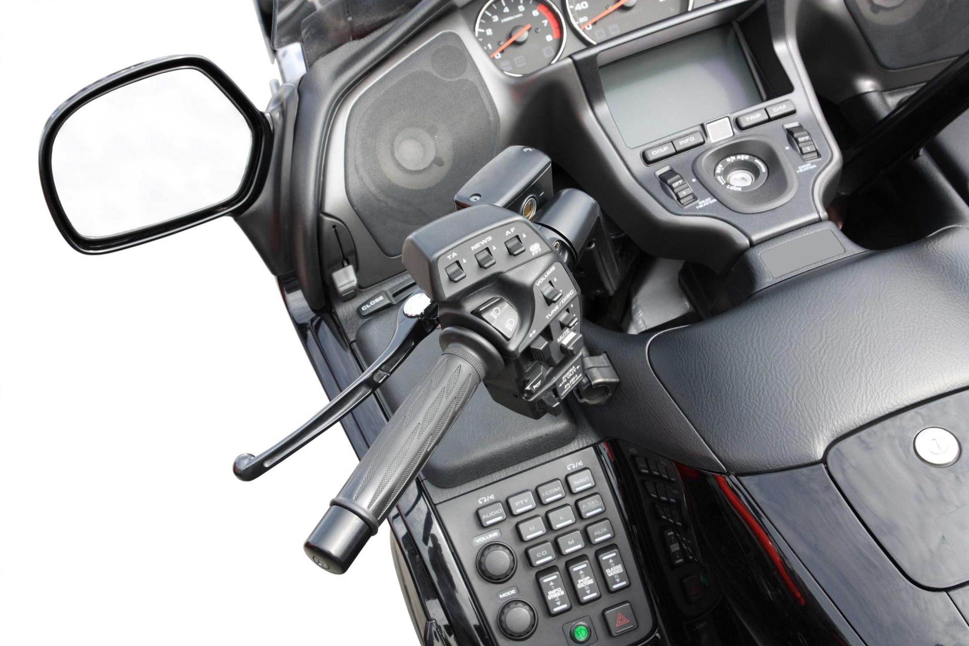 A close up of the dashboard of a motorcycle