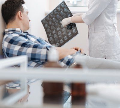 Personal Injury — Doctor Pointing At The X-ray Photo In St. Rapid City, SD