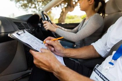 Driving instructor inside a car with student driver - Driving School - Yorktown. VA