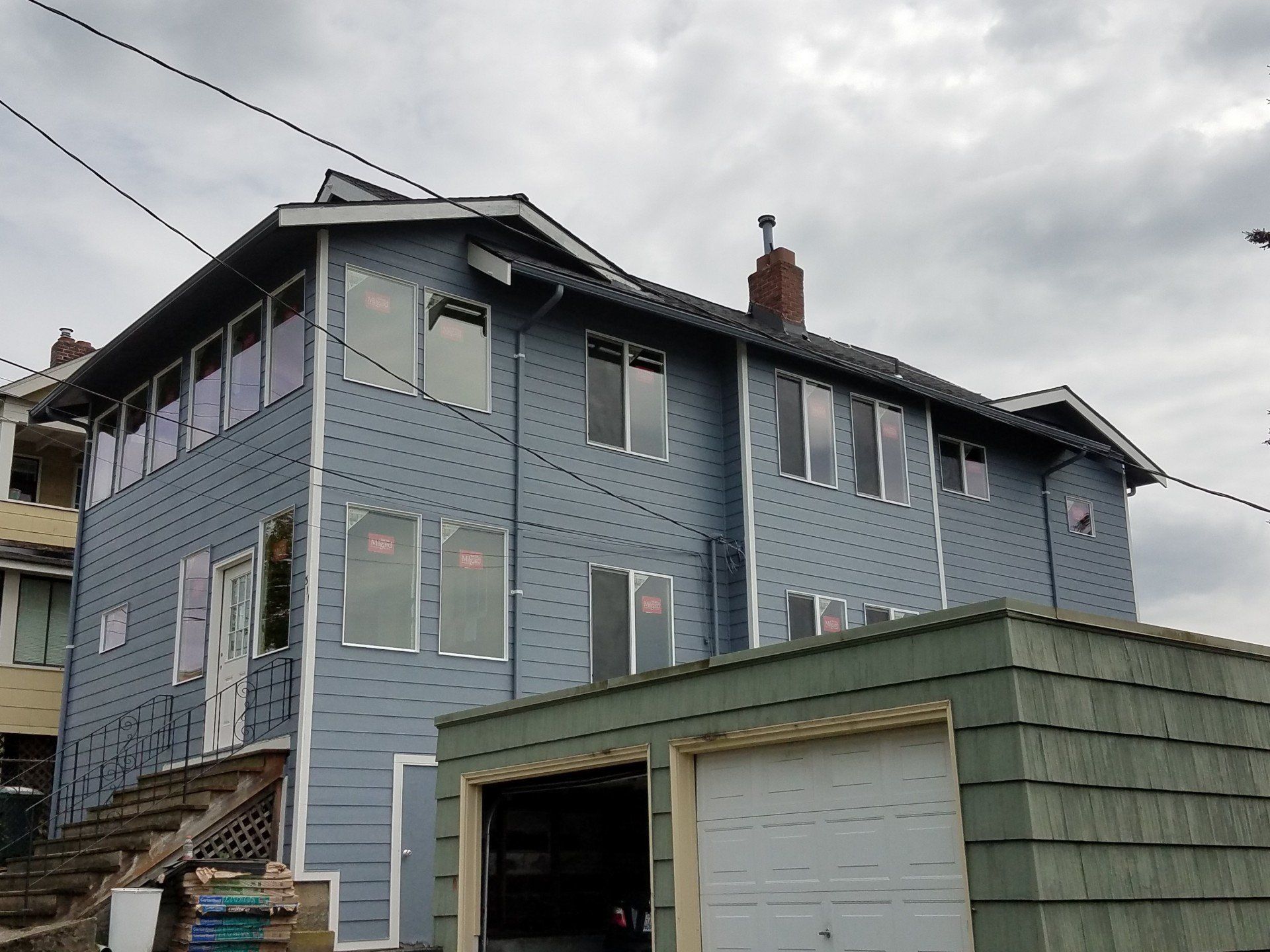 Ramco Blue House Exterior Remodeling