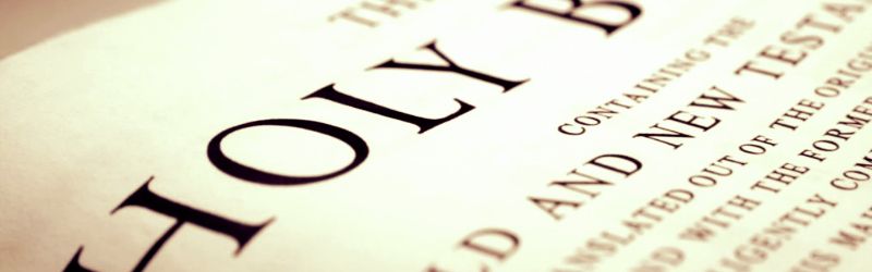 A close up of a page of the holy bible