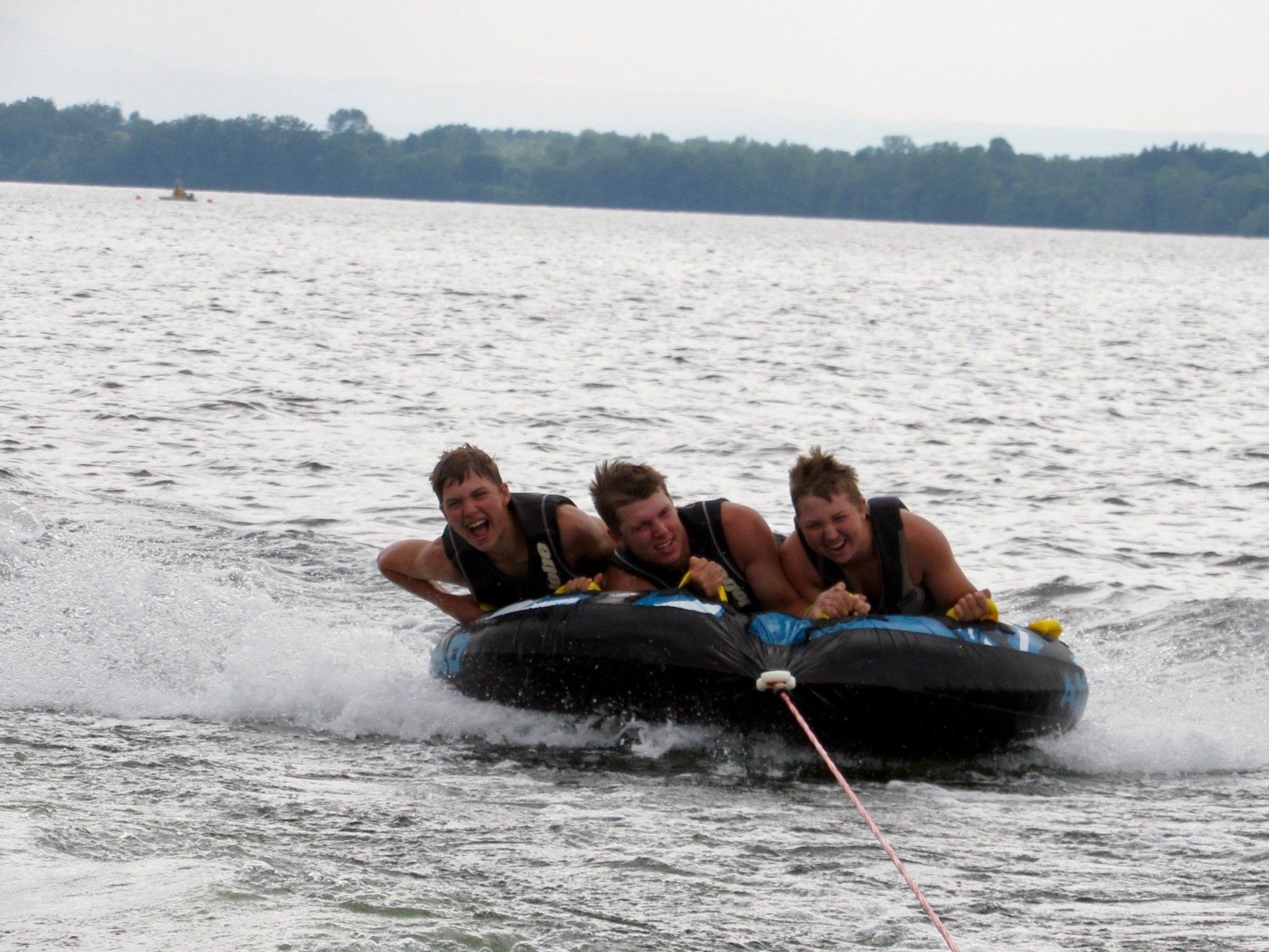3 boys tubing.