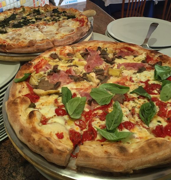 Pizza con condimento misto