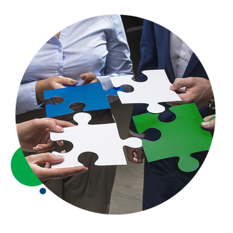 A group of people are holding puzzle pieces in their hands.