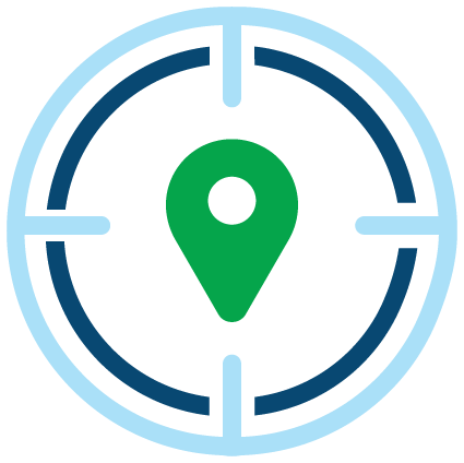 A target with a green pin in the middle of it.